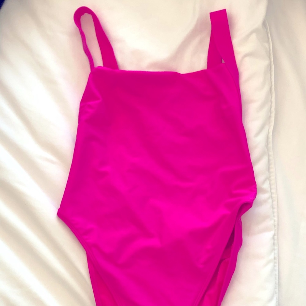 Bright pink one piece bathing suit